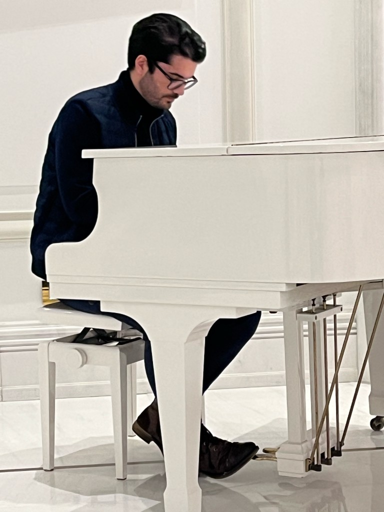 Gian playing piano — watch on YouTube